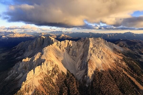Aerial view of the rocky peaks of Latemar at sunset, Dolomites, South Tyrol, Italy