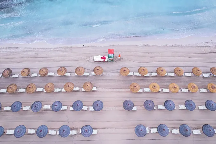 Framed Print : Aerial view of rows of beach umbrellas with a lifeguard tower on an sandy beach, Sicily island, Italy, Mediterranean Sea, Europe Framed Print : Aerial view of rows of beach umbrellas with a lifeguard tower on an sandy beach, Sicily island, Italy, Mediterranean Sea, Europe