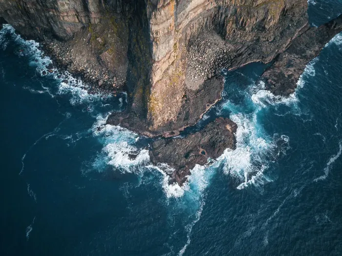 Framed Print : Aerial view of the rugged coastline of the Faroe Islands, Denmark, Atlantic, Europe Framed Print : Aerial view of the rugged coastline of the Faroe Islands, Denmark, Atlantic, Europe