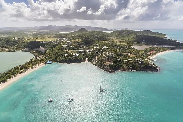 Aerial view of sailboats moored a few meters from the coast of Antigua, Leeward Islands