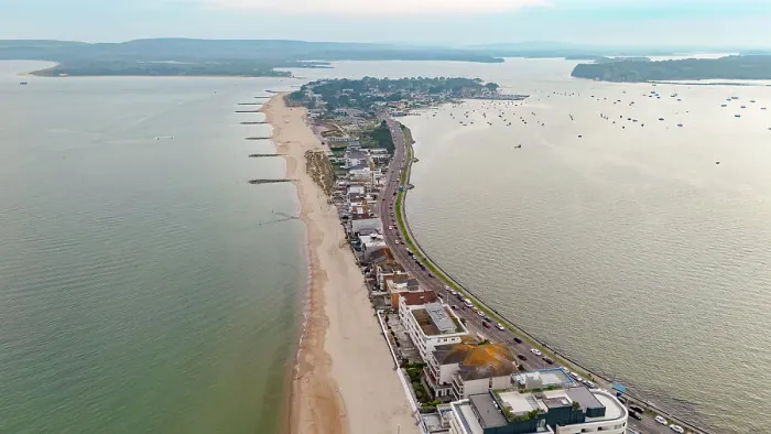 Framed Print : Aerial view of Sandbanks, a narrow spit of land extending into Poole Harbour, with Studland and Brownsea Island beyond, Dorset, England, United Kingdom, Europe Framed Print : Aerial view of Sandbanks, a narrow spit of land extending into Poole Harbour, with Studland and Brownsea Island beyond, Dorset, England, United Kingdom, Europe