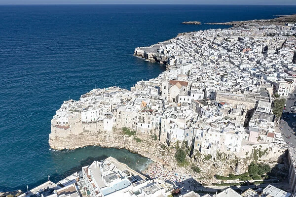 Aerial view of the sea town Polignano a Mare perched on cliffs, province of Bari, Apulia