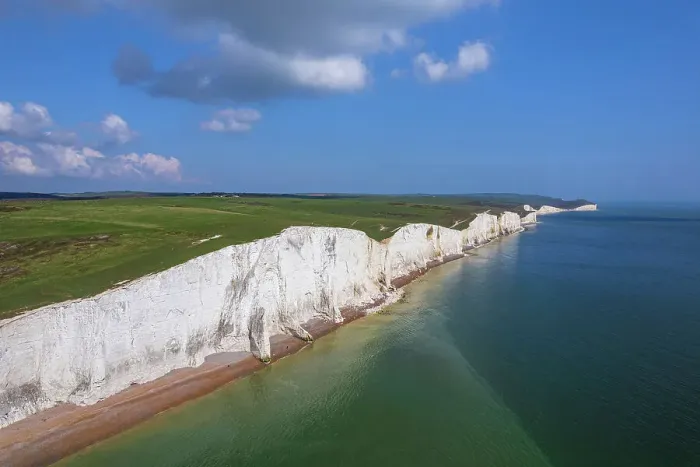 Framed Print : Aerial view of the Seven Sisters chalk white cliffs on a sunny day, South Downs National Park, East Sussex, England, United Kingdom, Europe Framed Print : Aerial view of the Seven Sisters chalk white cliffs on a sunny day, South Downs National Park, East Sussex, England, United Kingdom, Europe
