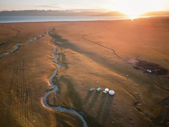 Framed Print : An aerial view of Son Kol lake area, with meandering river, yurts and camp at sunrise, Kyrgyzstan Framed Print : An aerial view of Son Kol lake area, with meandering river, yurts and camp at sunrise, Kyrgyzstan