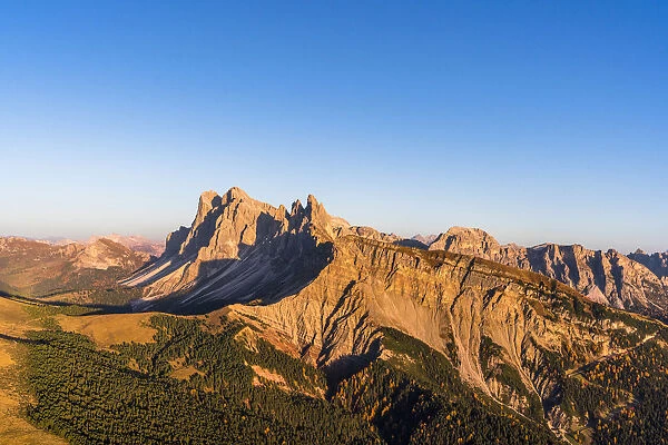 Aerial view of sunset over Seceda mountain in autumn, Cisles-Odle Nature Park, Dolomites