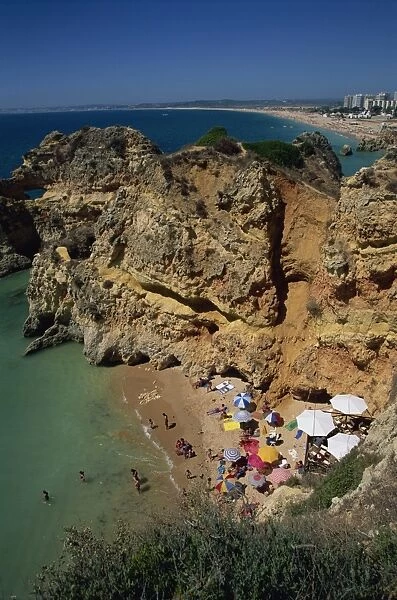 Aerial view of tourists on a small beach or cove on
