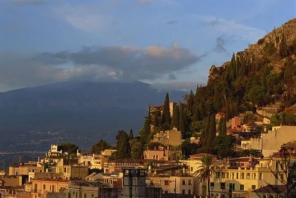 Aerial view over town of Taormina at dusk