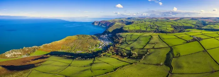 Framed Print : Aerial view over the Valley of the Rocks and Lynton, Exmoor National Park, North Devon Framed Print : Aerial view over the Valley of the Rocks and Lynton, Exmoor National Park, North Devon