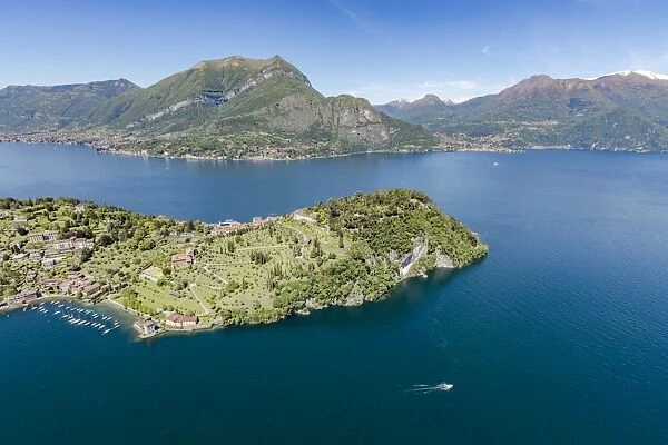 Aerial view of the village of Bellagio framed by clear waters of Lake Como with sailboats