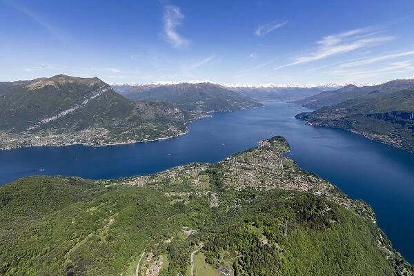 Aerial view of the village of Bellagio frames by the blue water of Lake Como on a sunny spring day