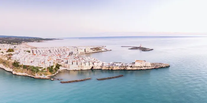 Framed Print : Aerial view of the white buildings of Vieste at sunrise, Foggia province Framed Print : Aerial view of the white buildings of Vieste at sunrise, Foggia province