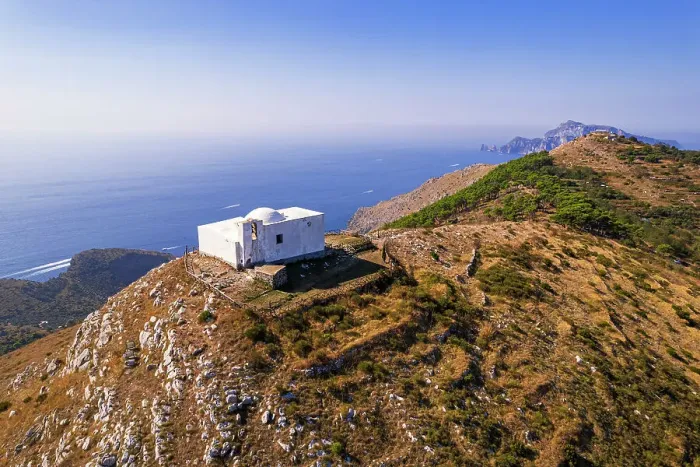 Framed Print : Aerial view of the white Chapel of San Costanzo on top of a mountain surrounding the sea of Amalfi coast, Punta Campanella, Massa Lubrense municipality, Naples province, Campania region, Italy, Europe Framed Print : Aerial view of the white Chapel of San Costanzo on top of a mountain surrounding the sea of Amalfi coast, Punta Campanella, Massa Lubrense municipality, Naples province, Campania region, Italy, Europe