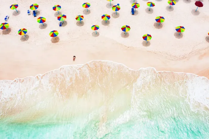 Framed Print : Aerial view of woman sunbathing on a tropical beach, Antigua, West Indies, Caribbean, Central America Framed Print : Aerial view of woman sunbathing on a tropical beach, Antigua, West Indies, Caribbean, Central America