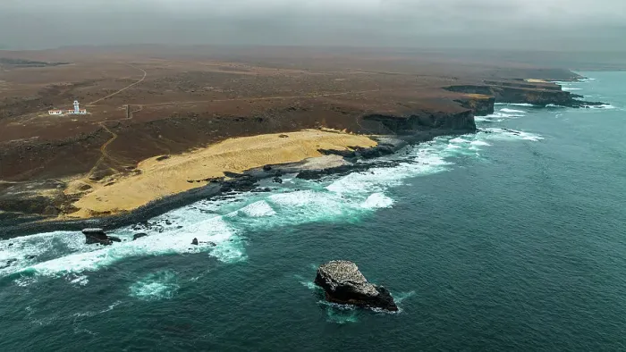Framed Print : Aerial of the wild coastline with basalt pools on the Atlantic coastline, Dombe Grande, Namibre, Angola, Africa