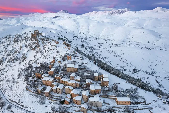 Framed Print : Aerial winter view of the snow covered medieval village of Rocca Calascio with the castle and pink sky at sunset, Rocca Calascio, Gran Sasso e Monti della Laga National Park, Campo Imperatore, L'Aquila province, Abruzzo region, Italy, Europe Framed Print : Aerial winter view of the snow covered medieval village of Rocca Calascio with the castle and pink sky at sunset, Rocca Calascio, Gran Sasso e Monti della Laga National Park, Campo Imperatore, L'Aquila province, Abruzzo region, Italy, Europe