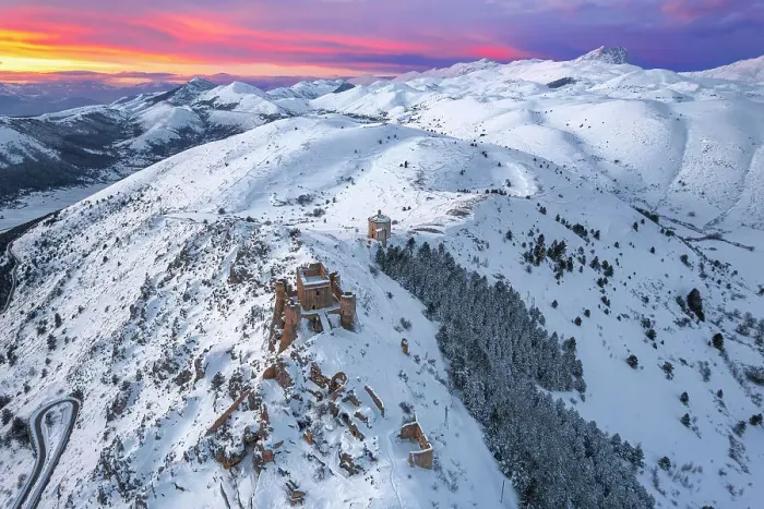 Framed Print : Aerial winter view of the snow covered Rocca Calascio castle and church of Santa Maria della Pieta, 'with pink clouds at sunset, Rocca Calascio, Gran Sasso e Monti della Laga National Park, Campo Imperatore, L'Aquila province, Abruzzo, Italy Framed Print : Aerial winter view of the snow covered Rocca Calascio castle and church of Santa Maria della Pieta, 'with pink clouds at sunset, Rocca Calascio, Gran Sasso e Monti della Laga National Park, Campo Imperatore, L'Aquila province, Abruzzo, Italy
