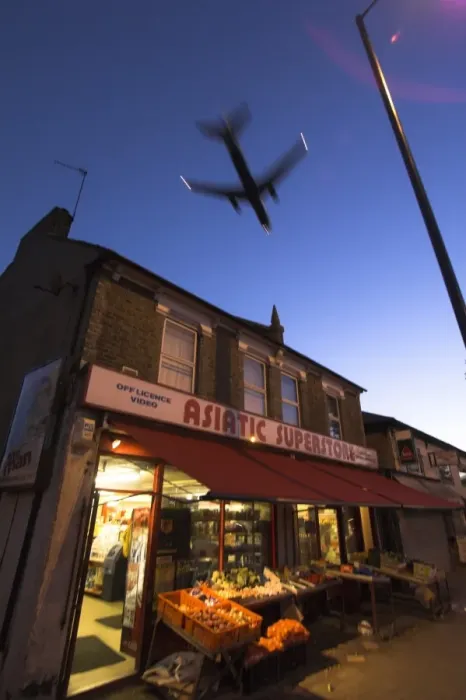 Framed Print : Aeroplane above shop, Hounslow, Greater London, England, United Kingdom, Europe Framed Print : Aeroplane above shop, Hounslow, Greater London, England, United Kingdom, Europe
