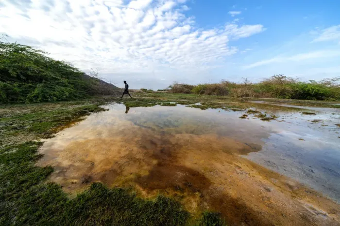 Framed Print : Afar man walking close to a geyser, Semera, Afar Region, Ethiopia, Africa Framed Print : Afar man walking close to a geyser, Semera, Afar Region, Ethiopia, Africa