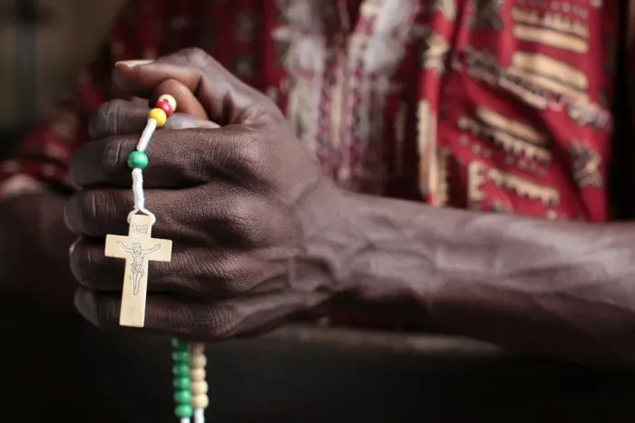 Framed Print : African man praying the rosary, Cotonou, Benin, West Africa, Africa Framed Print : African man praying the rosary, Cotonou, Benin, West Africa, Africa