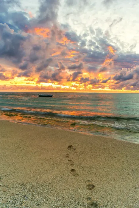 Framed Print : African sunset over footprints on tropical sand beach, Le Morne Brabant, Black River Framed Print : African sunset over footprints on tropical sand beach, Le Morne Brabant, Black River