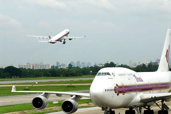 Airplanes taxiing, Don Muang airport, Bangkok, Thailand, Southeast Asia, Asia
