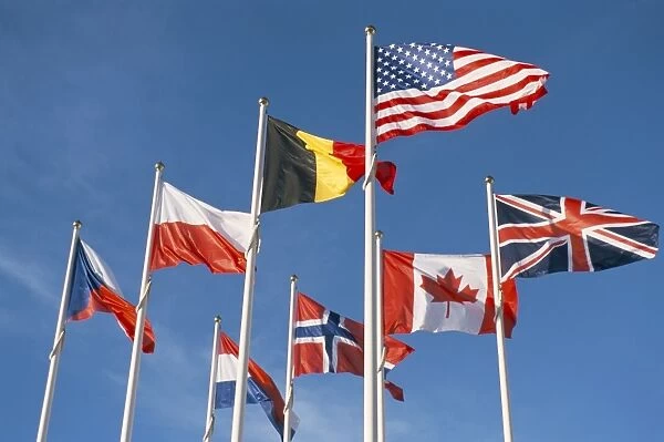 Allied forces flags flying at War Landing Beaches, Calvados, Normandy, France, Europe