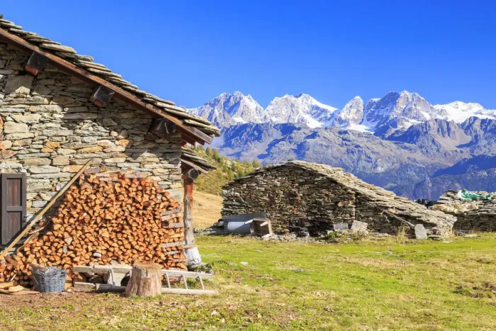 Framed Print : Alpine huts framed by snowy peaks of Bernina Group, Arcoglio Alp, Val Torreggio, Malenco Valley Framed Print : Alpine huts framed by snowy peaks of Bernina Group, Arcoglio Alp, Val Torreggio, Malenco Valley