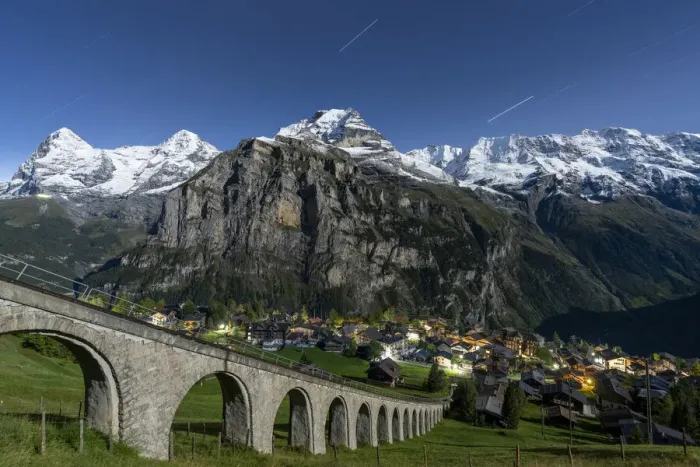 Framed Print : Alpine village of Murren and funicular railway lit by star trail, Lauterbrunnen Framed Print : Alpine village of Murren and funicular railway lit by star trail, Lauterbrunnen