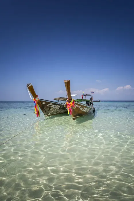 Framed Print : Amazing Blue Water at Bamboo Beach, Maya Bay with long tail boats, Phi Phi Lay Island