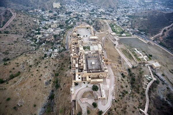 Amber Palace and village of Amber in the Aravali Hills, Rajasthan, India, Asia