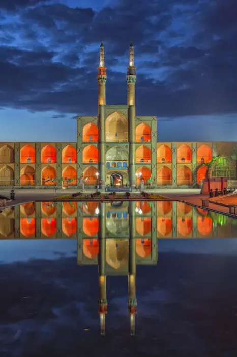 Framed Print : Amir Chaqmaq complex facade illuminated at sunrise and reflecting in a pond, Yazd