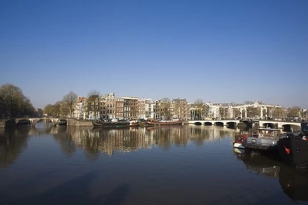 The Amstel River and Magere Bridge, Amsterdam, Netherlands, Europe