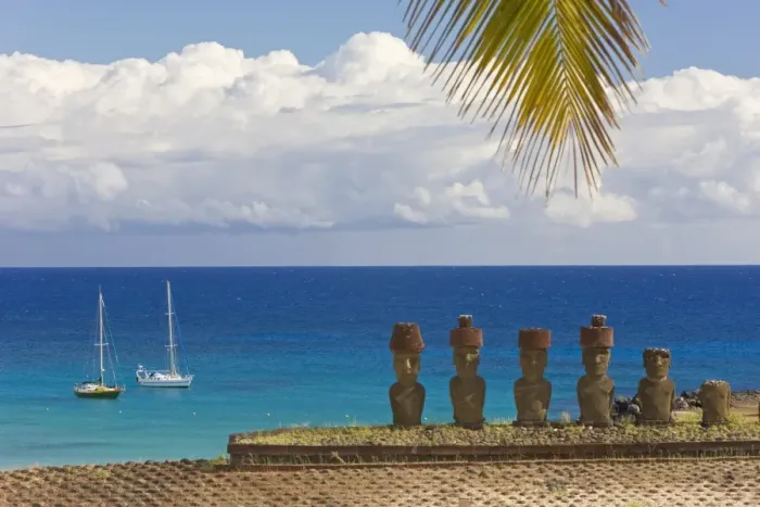 Framed Print : Anakena beach, yachts moored in front of the monolithic giant stone Moai statues of Ahu Nau Nau Framed Print : Anakena beach, yachts moored in front of the monolithic giant stone Moai statues of Ahu Nau Nau