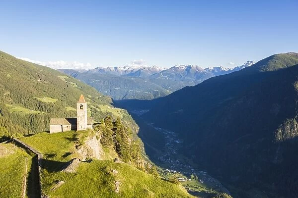 Ancient church perched on mountains, San Romerio Alp, Brusio, Canton of Graubunden