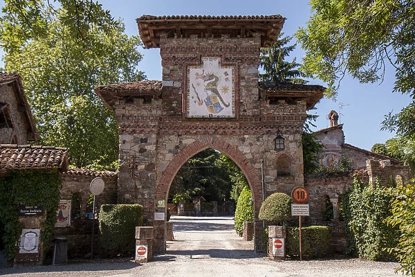 Ancient entry gate arch of the village of Grazzano Visconti, Emilia Romagna, Italy, Europe