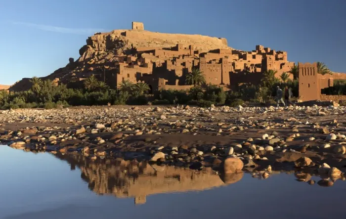 Framed Print : The ancient Kasbah Ait Benhaddou bathed in morning light and reflecting in river Framed Print : The ancient Kasbah Ait Benhaddou bathed in morning light and reflecting in river