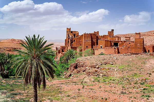 Ancient kasbah surrounded by palm trees, Ounila Valley, Atlas mountains, Ouarzazate province, Morocco, North Africa, Africa