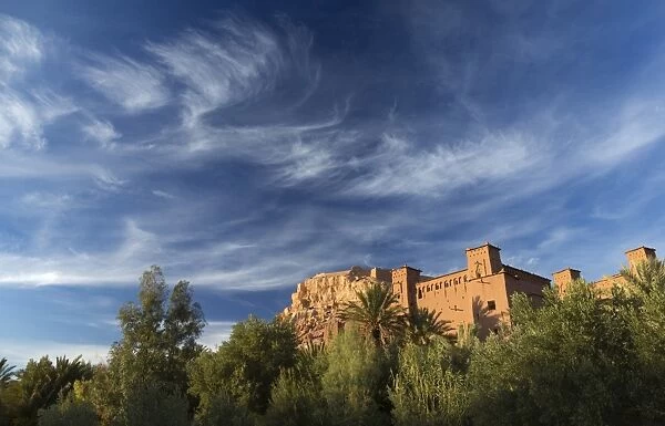 The ancient mud brick buildings of Kasbah Ait Benhaddou bathed in evening light