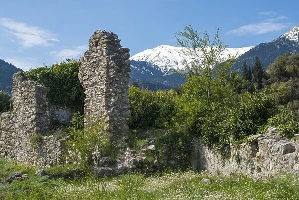 The ancient ruins of Mystras, UNESCO World Heritage Site, and the snow covered Taygetos