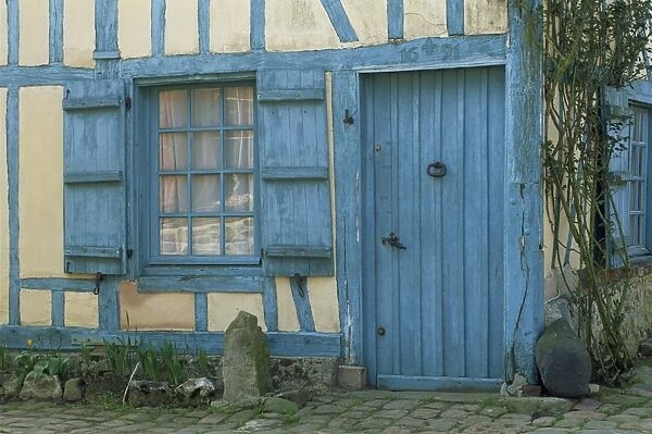 Ancient timbered house with the date of 1691 carved above doorway, Gerberoy
