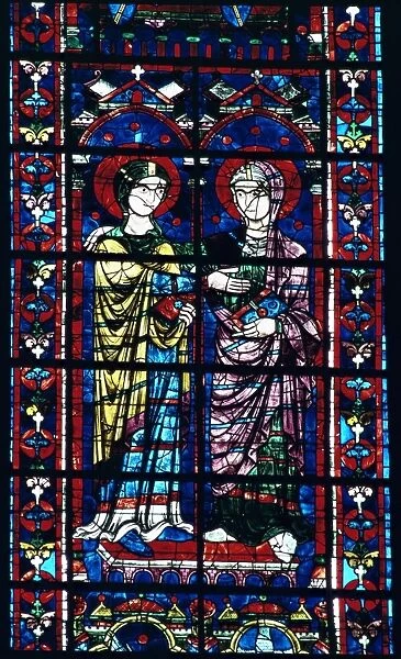 Two angels in stained glass in the central choir, dating from 12th century