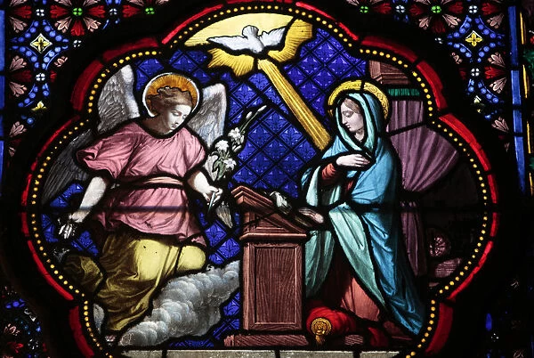Annunciation of Mary stained glass in Sainte Clotilde church, Paris, France, Europe