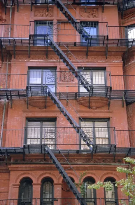 Framed Print : Apartment fire escapes