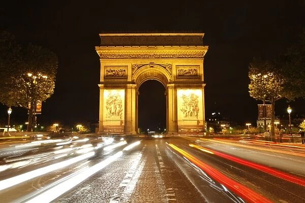 Arc de Triomphe and Champs Elysees at night, Paris, France, Europe