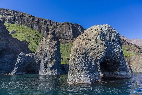 Arch of columnar basalt on the southern coast of Disko Island, Kuannersuit, Greenland, Polar Regions