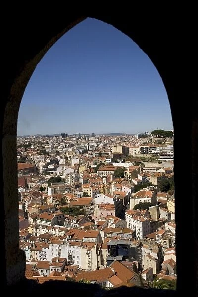 An arched window at the Castelo Sao Jorge (Castle of St. George) provides a view of Lisbon