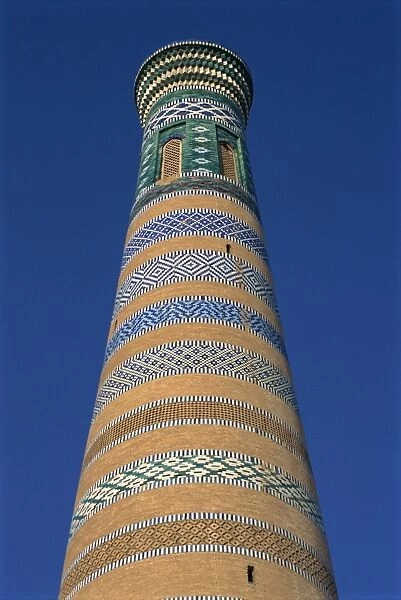 Architectural details of bricks and tiles on the Islom-Huja minaret in Khiva