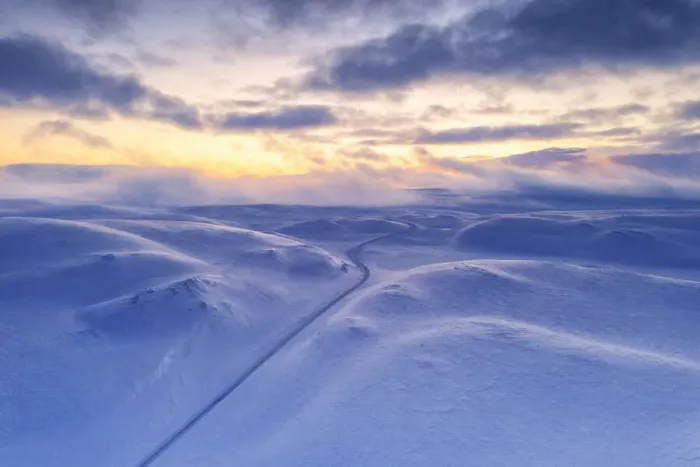 Framed Print : Arctic sunset over Tanafjordveien empty road crossing the snowy mountains after blizzard Framed Print : Arctic sunset over Tanafjordveien empty road crossing the snowy mountains after blizzard