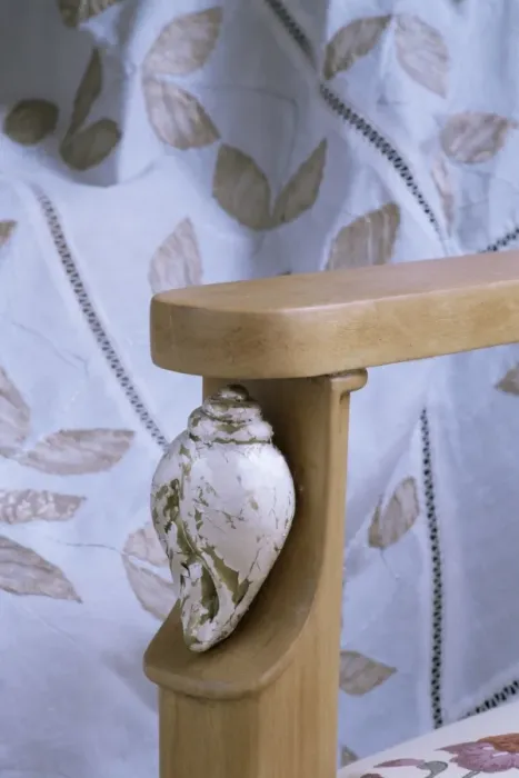 Framed Print : Detail of the arm of a drawing room chair in new build home