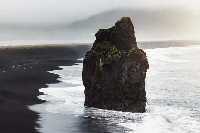Framed Print : Detail of Arnardrangur rock in the middle of peninsula near Reynisfjara Beach view point Dyrholaey in overcast weather Framed Print : Detail of Arnardrangur rock in the middle of peninsula near Reynisfjara Beach view point Dyrholaey in overcast weather